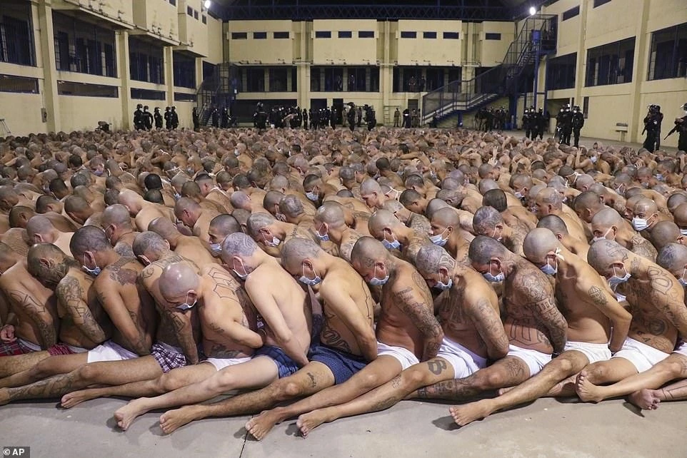 27666050-8258201-masked-inmates-are-forced-to-it-skin-to-skin-in-their-boxer-shor-a-48-1587907692447.jpg