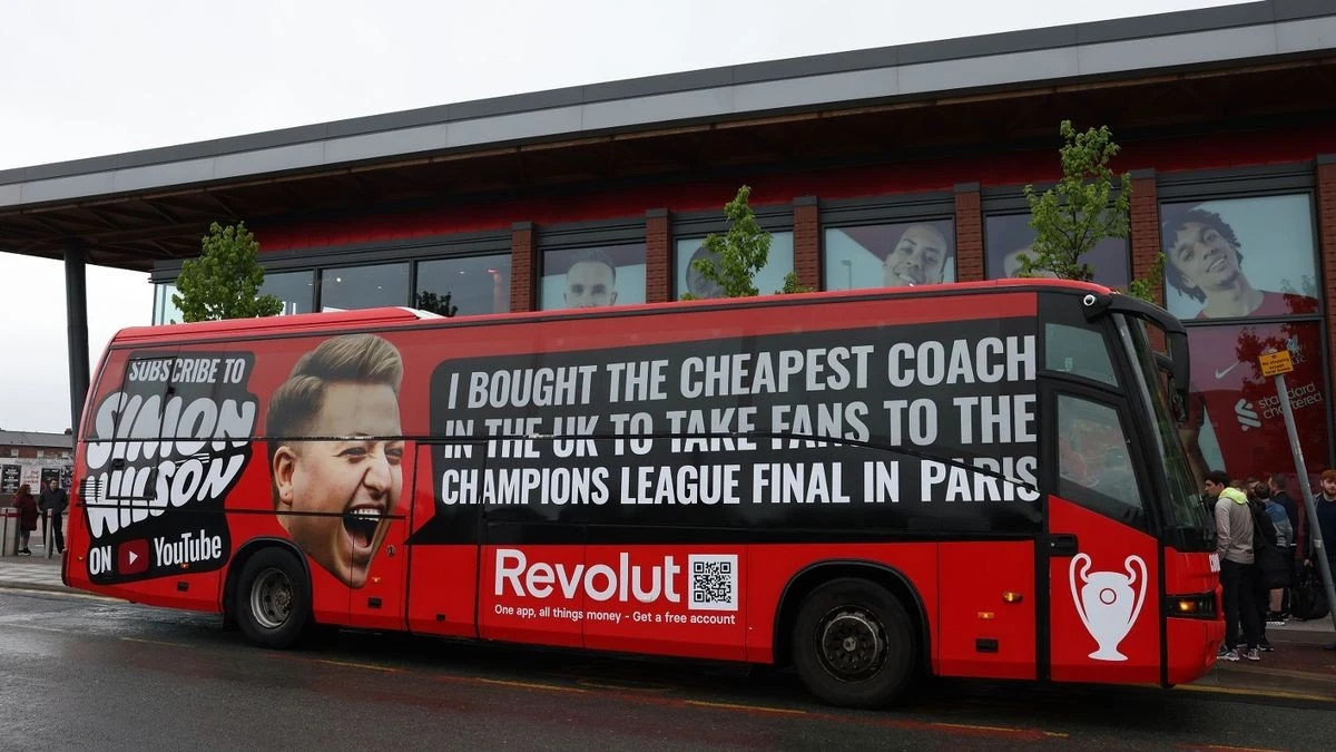 1-youtuber-simon-wilson-with-the-bus-he-has-hired-to-take-liverpool-fans-to-paris-for-the-champions-le.jpg